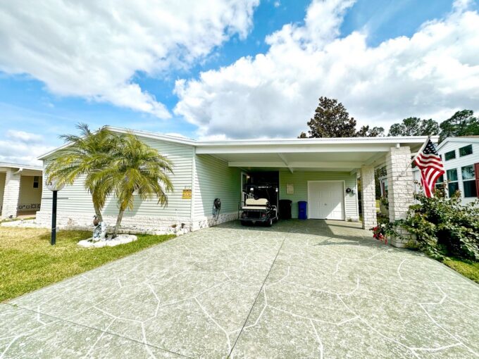 Beautifully Accessible home (Mint Green, White Trim) at 1613 Darrington LN, Lakeland, Florida in Schalamar Creek Golf Club