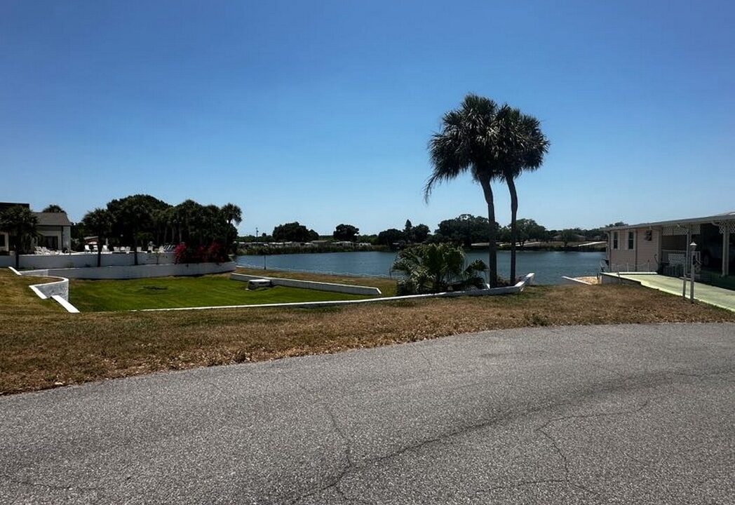 View of Clubhouse Courtyard and Lake Hester