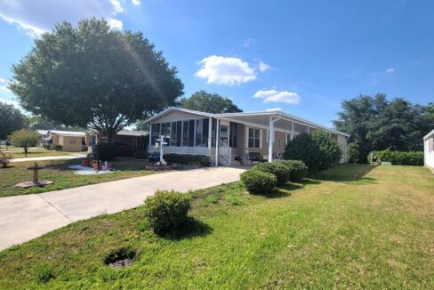 512 Caymen in Towerwoods located in Lake Wales, had a private drive, carport, gutters, lanai, storage shed, new appliances.