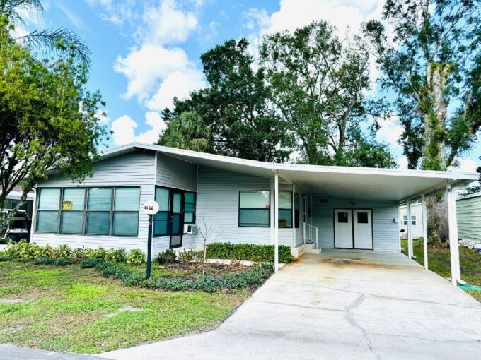 This stunningly renovated 2-bedroom, 2-bathroom home in the award-winning Schalamar Creek Golf Community. Private driveway, storage shed, carport, gutters, lanai.