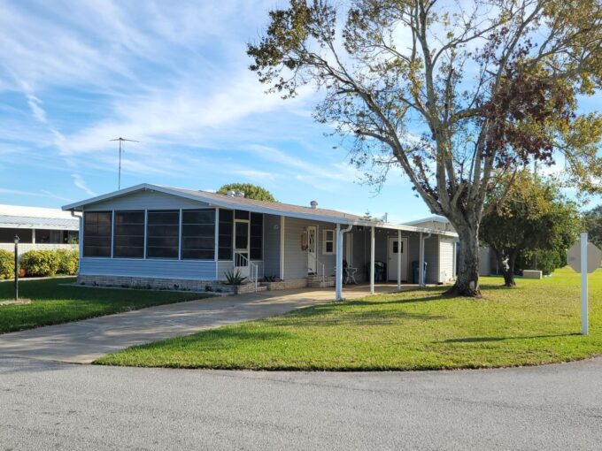 This charming 1986 DOUBLE-WIDE mobile home, located on a prime CORNER LOT, offers 1,040 sq. ft. of FULLY FURNISHED living space. With spacious 2-BEDROOMS and 2 bathrooms, this home is ideal for comfort and convenience and MOVE-IN READY.