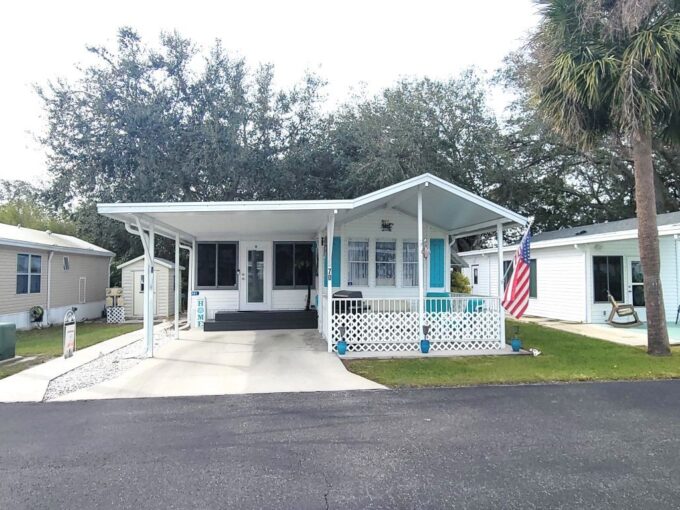 This beautifully maintained 1993 PARK MODEL offers 888 sq.ft. of WELL-DESIGNED living space. MOVE-IN READY and PARTIALLY FURNISHED, it features 1 BEDROOM and 1.5 BATHS, providing the perfect blend of comfort and functionality. Front covered porch, private driveway, storage shed, deck in the back of home.