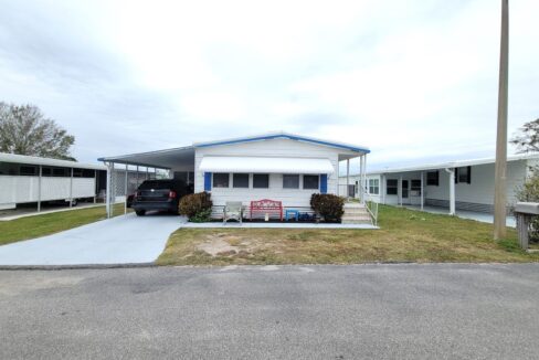 Private backyard with Orange Grove views. This partially furnished, 2-bedroom, 2-bath, Double-wide welcomes you with a wonderful covered front door entrance into this 1977 mobile home featuring 1440 sq. ft. Private driveway, carport, storage shed, lanai.