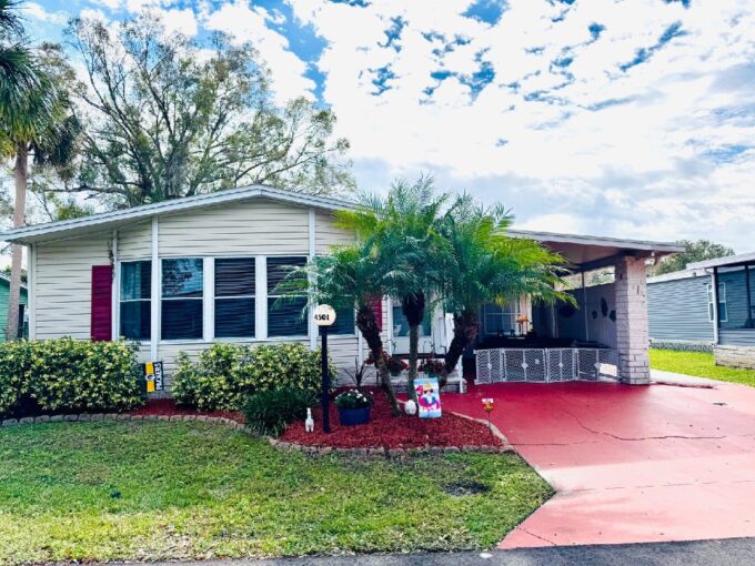 This home is located in Schalamar Creek Golf & Country Club, an award winning, gated, 55+ Golf Community in Lakeland, Florida. Homes in this community are on lot leased land. Owning the home, but not the land, you pay a monthly lot rent of $ 976 which gives you and your guest access to the amenities of the community. Welcome to your dream home! This spacious and meticulously maintained two-bedroom, two-bathroom home is perfect for buyers seeking comfort, convenience, and endless possibilities. Whether you’re downsizing, or looking for a vacation retreat, this property checks all the boxes.