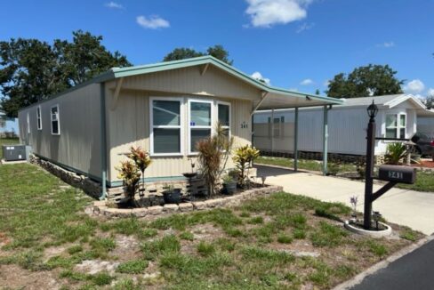 Split Floor Plan Double Pane Windows Kitchen Pantry 2023 Hot Water Tank Metal Roof 2018 Screened Lanai 13 x 11 Inside Laundry Covered Carport + Storage Shed