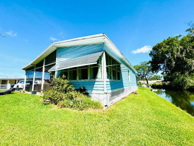 Looking for the perfect spot to park your boat, in a peaceful 55+ lakefront community? Look no further! Step out your front door and it will be waiting for you in a private canal giving you access to Lake Shipp and the Winter Haven Chain of Lakes!  This charming community offers the perfect blend of relaxation, outdoor recreation, and social living.