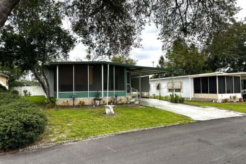 1152 sq ft of living space needs some TLC, front lanai, private driveway, storage shed, 2 bedrooms with walk in closets, 2 bathrooms.