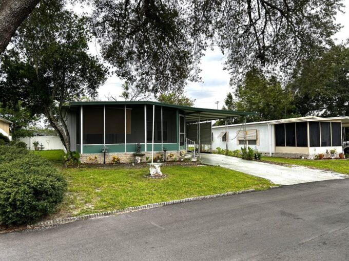 1152 sq ft of living space needs some TLC, front lanai, private driveway, storage shed, 2 bedrooms with walk in closets, 2 bathrooms.