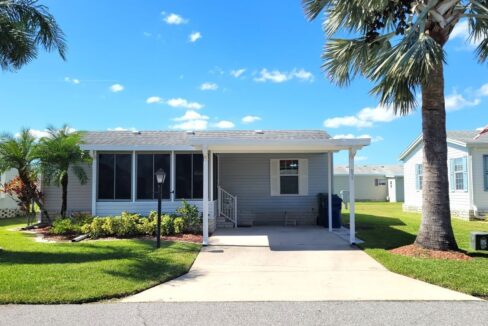 this charming 2005, beautifully updated 2-BEDROOM, 2-BATH… 864 sq. ft. DOUBLEWIDE with a pleasing OPEN-CONCEPT comfort with an ideal SPLIT-BEDROOM layout. Front Lanai, carport, private driveway.