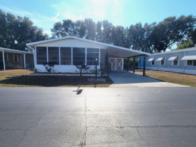 EXTERIOR FEATURES… • 10×20 SCREENED LANAI with TINTED VINYL WINDOWS for added privacy • WOOD RAMP to side entrance • 26×12 GARAGE/WORKSHOP with DOUBLE DOORS • 8×6 ATTACHED STORAGE SHED • PERIMETER LOT for added privacy • Located on a LOW-TRAFFIC STREET This home truly CHECKS ALL THE BOXES — AND MORE. Don’t let this one slip away! Spacious Garage, Perimeter Lot!
